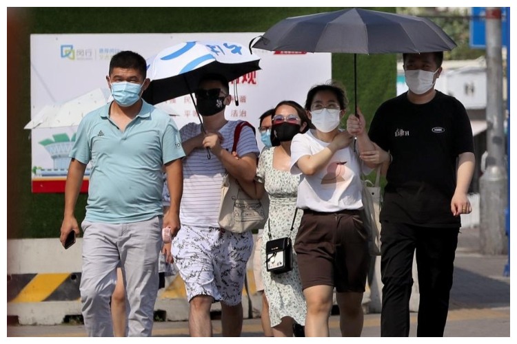 चीन में 35 डिग्री सेल्सियस में ही लोग परेशान, यलो अलर्ट जारी