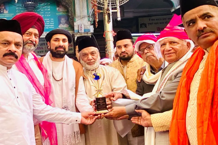 Haji Syed Salman Chishty- Gaddi Nashin, Dargah Ajmer Sharif presenting the Global Peace award to RSSB senior officials