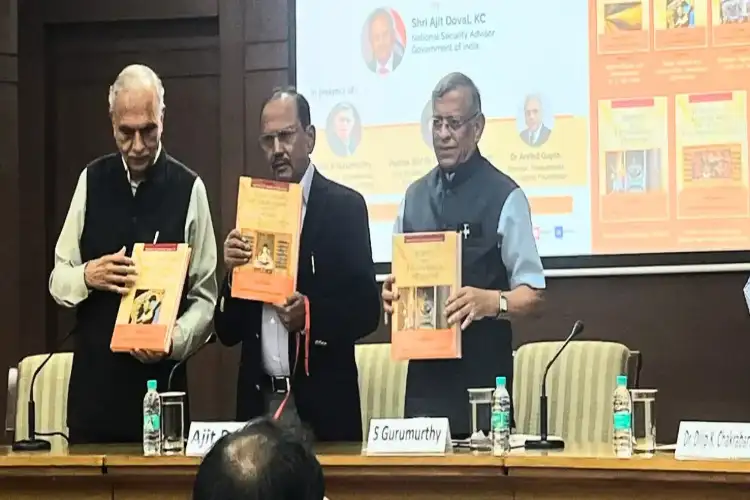 National Security advisor Ajit Doval releasing History of Ancient India. Gurumurthy (Right) and Dr Arvind Gupta (left) are also with him