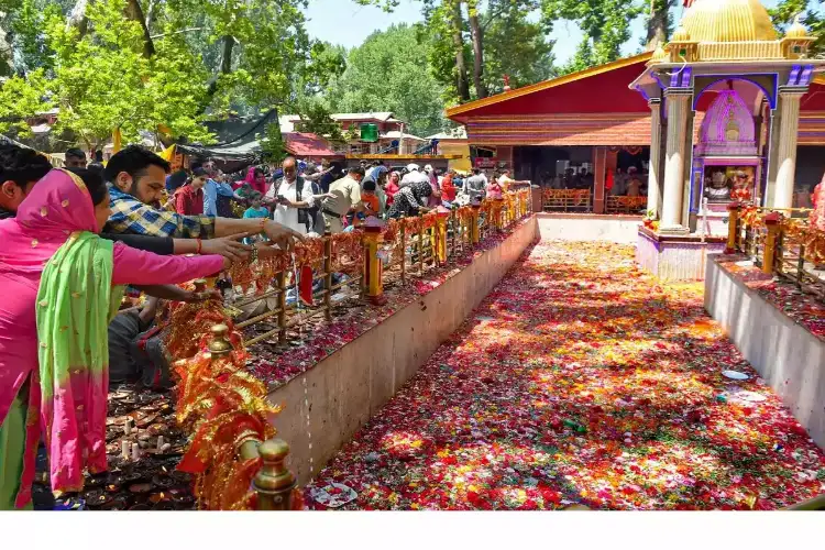J-K: Devotees offer prayers at Mata Kheer Bhawani Temple in Tullamulla during annual Kheer Bhawani Mela