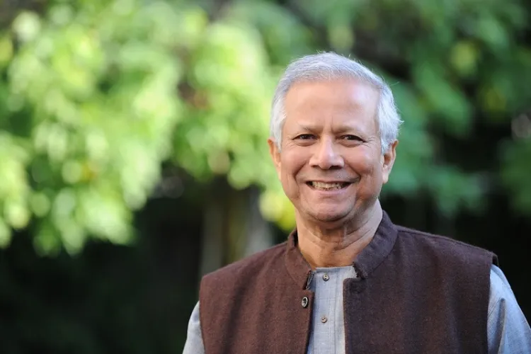 Why is Professor Yunus demanding mid-term elections in Bangladesh?