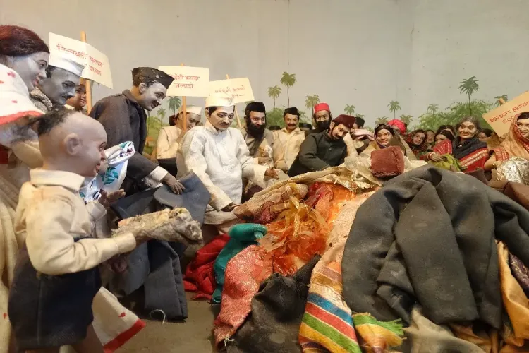  A diorama of Mahatma Gandhi leading satyagrahis in burning British clothes