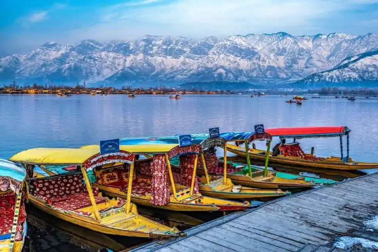 J-K: Tourists enjoy Shikara rides on Dal Lake in Srinagar amid winter chill