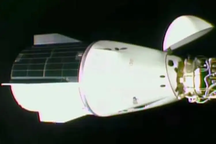 SpaceX Dragon docks with ISS to bring back stranded astronauts