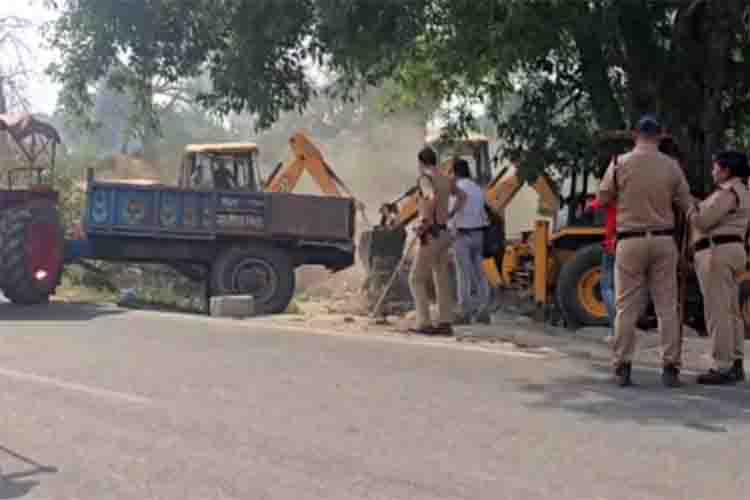 Administration's bulldozer runs on illegal mazar in Haridwar