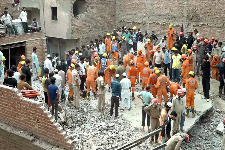11 killed, 11 injured as four-storey building collapses in north-east Delhi – rescue operations lasted for 12 hours