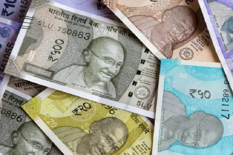 Rupee depreciated by 8 paise to 84.38 against the US dollar in early trade