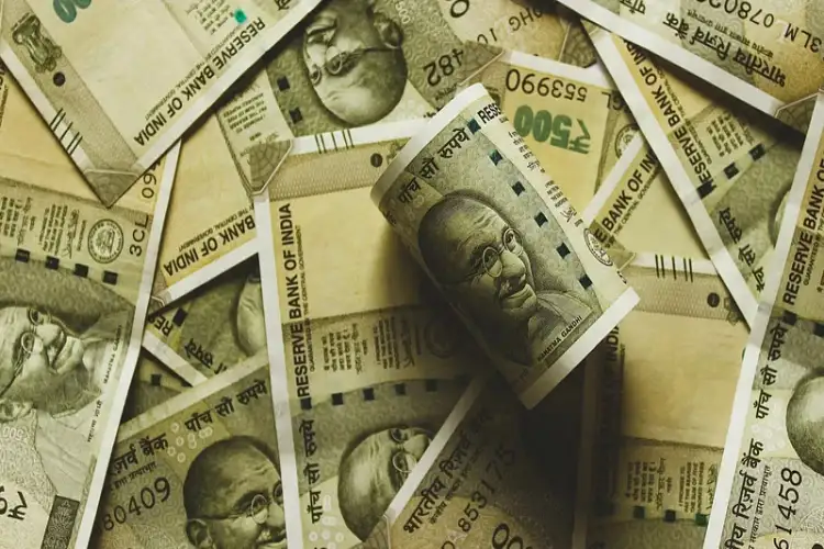 Rupee fell 4 paise to 85.72 against the dollar in early trade