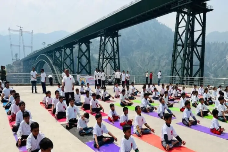J-K: Yoga session held at Chenab Rail Bridge, world's highest railway bridge, in Reasi