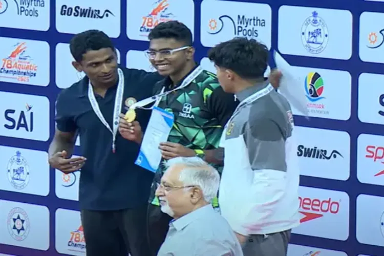Rohit creates history in 100m butterfly, sets best Indian time