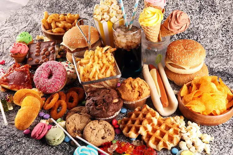 Be aware of hidden fats and sugars in pizzas or burgers, and develop a healthy lifestyle, say Doctors