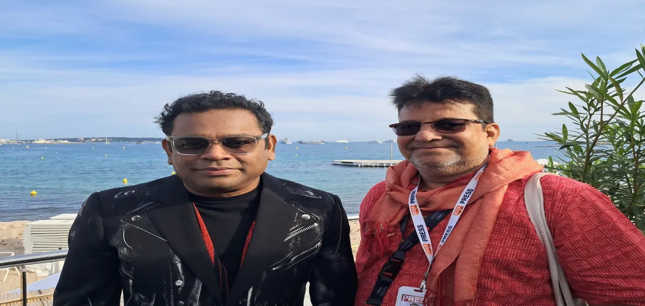 Ajit Rai discussing a special topic with musician AR Rahman