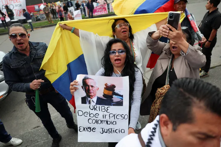 Colombia's former president sentenced to 12 years of house arrest, found guilty of bribery