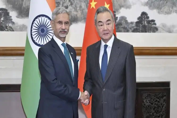 India-China relations showing positive trend toward returning to cooperation, says Wang Yi