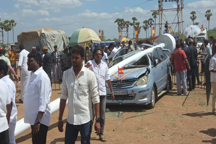 A 100-foot-high flag pole fell on a car at actor Vijay's party conference, a major accident averted