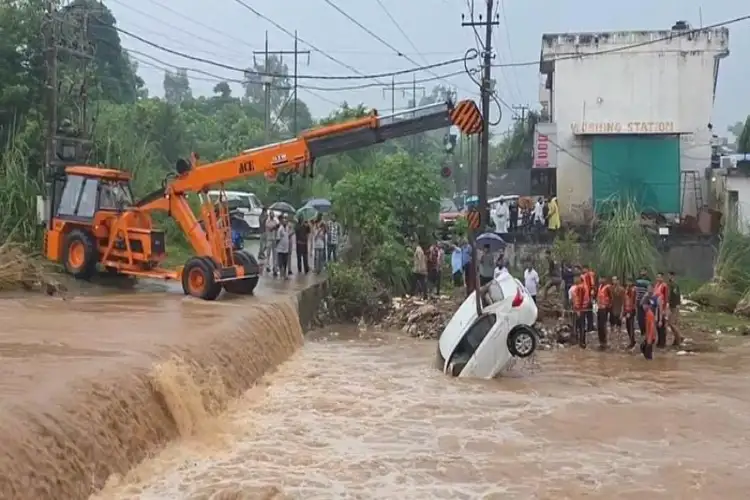 J-K: Car swept away by heavy water flow rescued in Kathua
