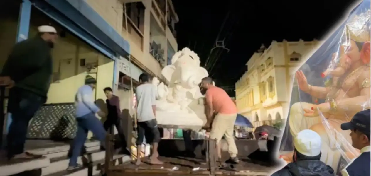 Hindu-Muslim youth in Karad carrying Ganesha idols to a safer place from the flood waters