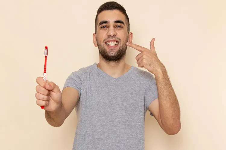 Why is it important to brush your teeth at night?
