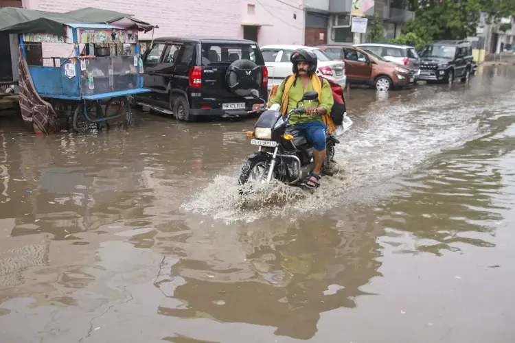 Heavy rains in Kolkata disrupt daily life, several areas flooded.