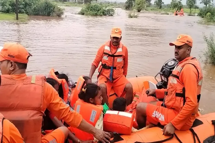 Maharashtra: 17 people rescued safely from a bus stranded in a flooded area in Palghar district