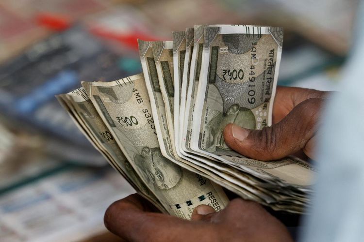 Rupee gains 3 paise to 88.69 per dollar in early trade