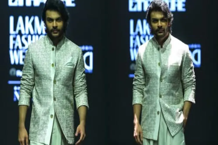 Veer Pahadia turned showstopper for Abraham & Thakore in a white traditional outfit at Lakme Fashion Week