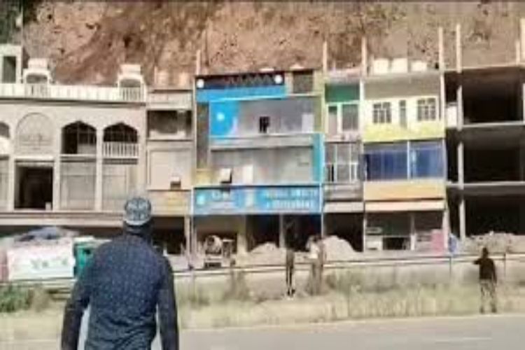 Several commercial buildings damaged in a landslide in Jammu and Kashmir's Udhampur.