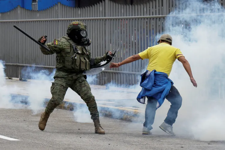 Protesters and police clash in Ecuador over fuel prices