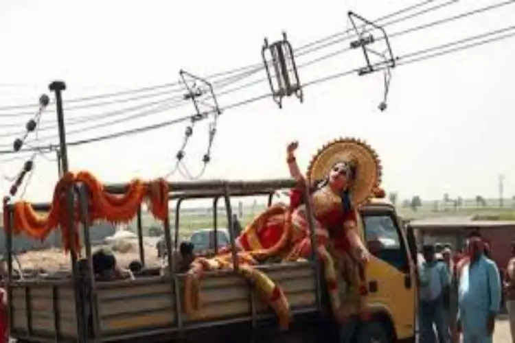 Noida: Pickup vehicle carrying people returning after idol immersion falls off bridge, three dead