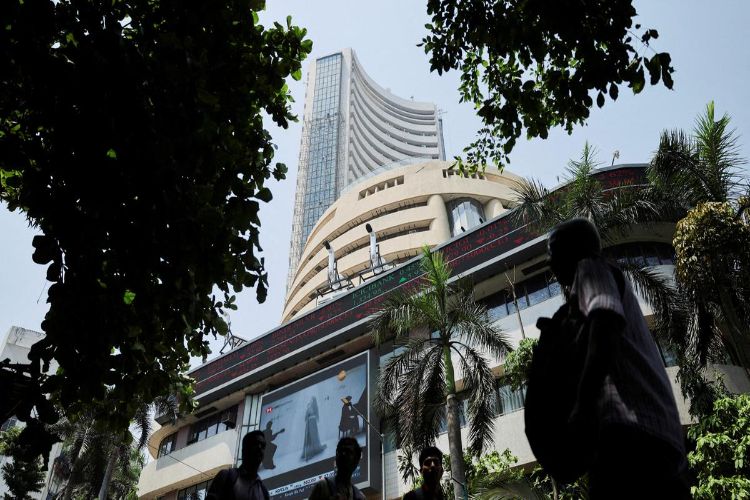 Sensex, Nifty close marginally higher in volatile trade