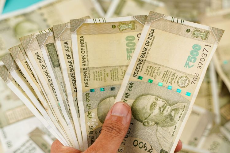 The rupee fell six paise to an all-time low of 90.02 per dollar in early trade.