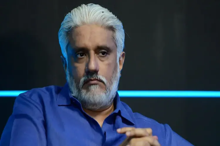 Director arrested on fraud charges