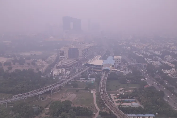 Air quality in Delhi-NCR shows slight improvement, but remains in the 'poor' category; a light haze hangs over the city.