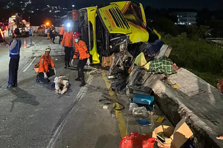 At least 16 killed as speeding bus overturns on highway in Indonesia's Java