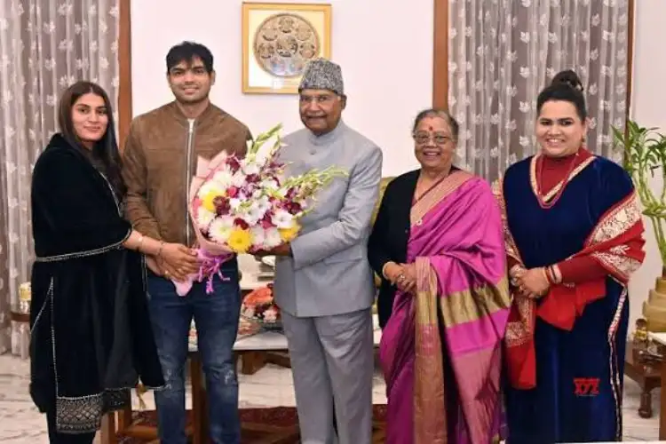 Neeraj Chopra, his wife Himani pay courtesy visit to former president Ram Nath Kovind
