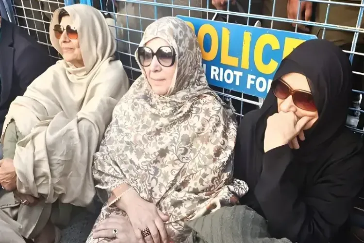 Pakistan: Sisters stage protest near Adiala Jail after being denied permission to meet Imran Khan.