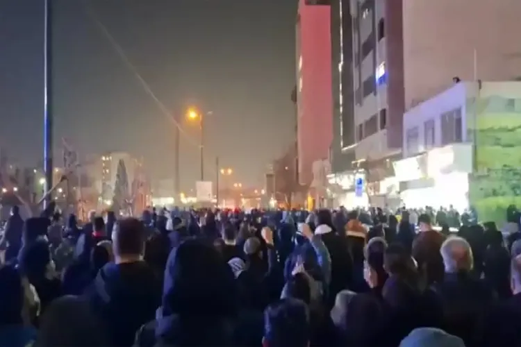 Amid protests in Iran, a building associated with state television catches fire; investigation underway.