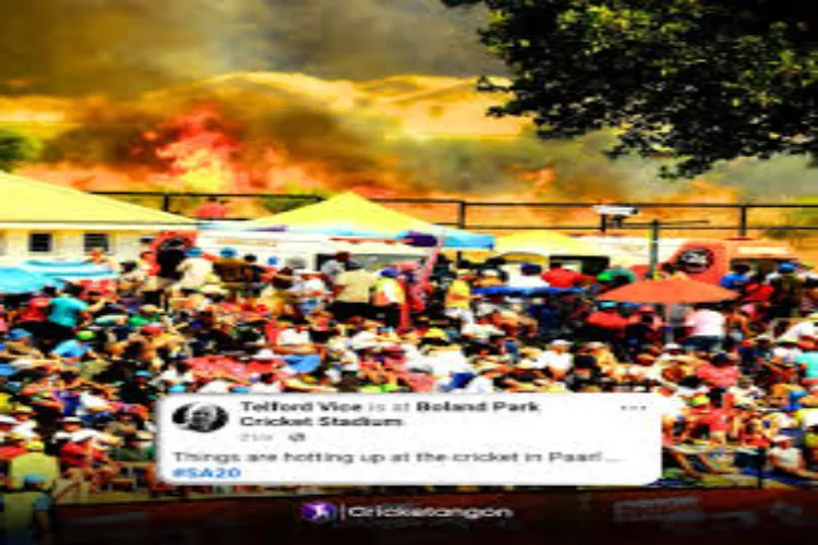 Fire breaks out outside Boland Park during SA20 match; play continues.