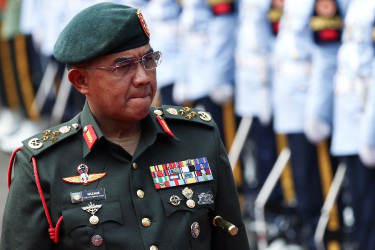 Two former top army officers will be tried for corruption in Malaysia