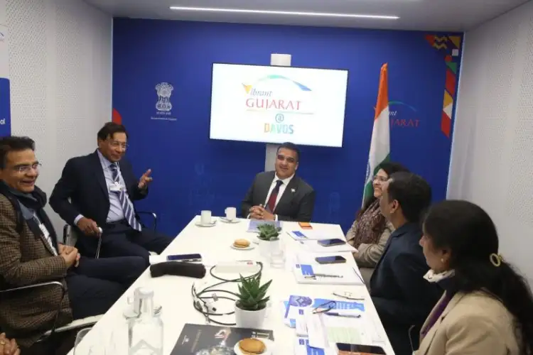 Gujarat Dy CM Harsh Sanghavi meets Wellspun's Balkrishan Goenka, ArcelorMittal's Lakshmi Mittal at Davos