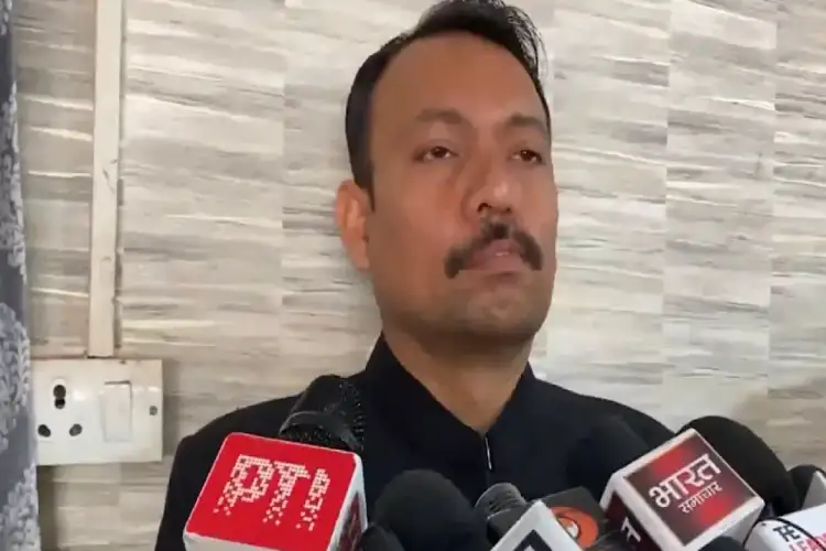 UP: Former City Magistrate Alankar Agnihotri sits on protest outside DC office in Bareilly