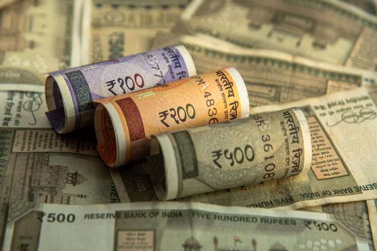 Rupee falls 18 paise to 93.94 per dollar in early trade