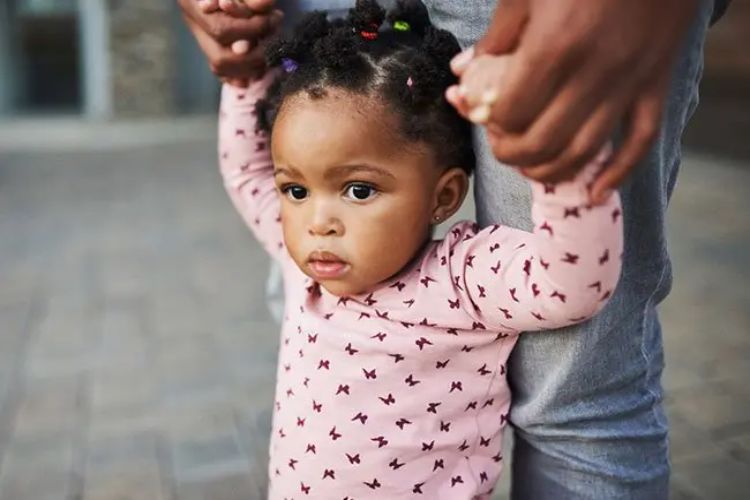 Delayed walking and sitting in children could be a sign of SMA; timely screening is essential.