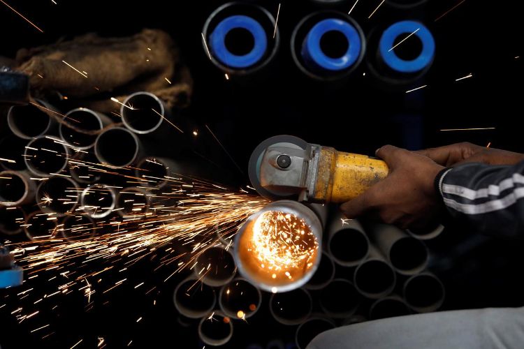 India's manufacturing sector growth in March fell to a four-year low: PMI