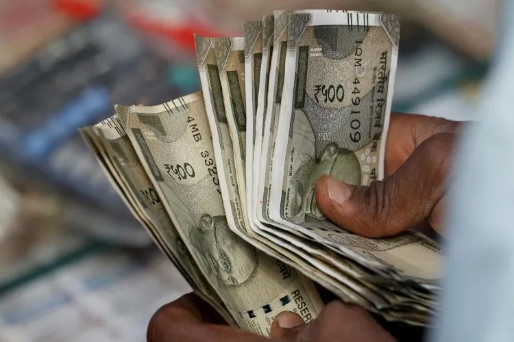 Rupee strengthens by 4 paise to 94.84 against US dollar