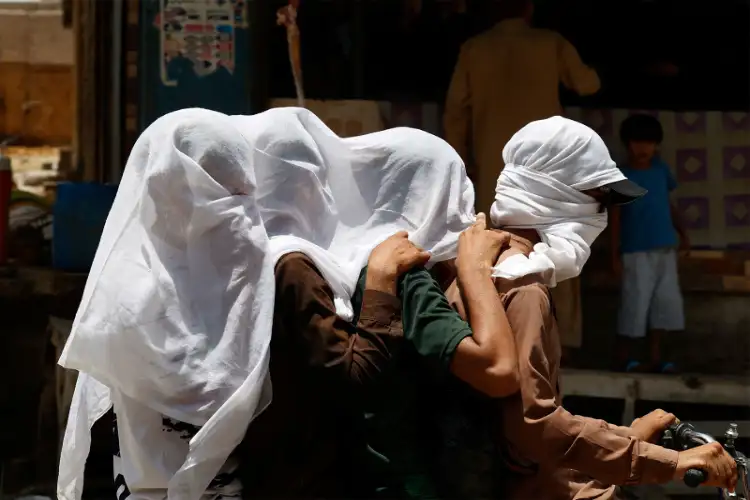 Karachi simmers in 46°C heat as utility collapse and systemic apathy leave residents parched