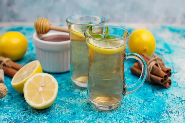 What changes occur in the body after drinking lemon-honey water for a month?