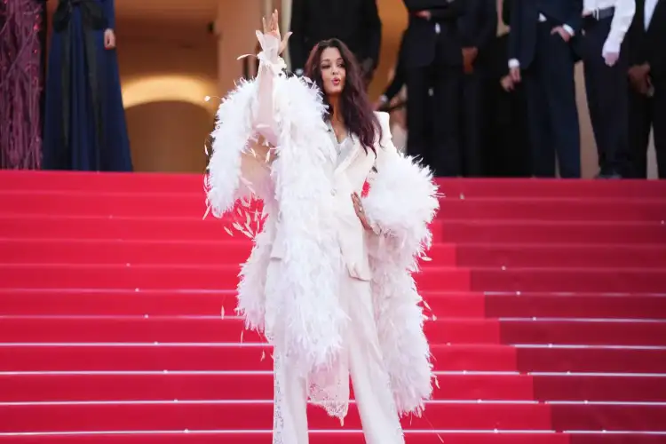 Cannes 2026: Aishwarya Rai Bachchan turns heads in ethereal feathered cape lookCannes 2026: Aishwarya Rai Bachchan turns heads in ethereal feathered cape look