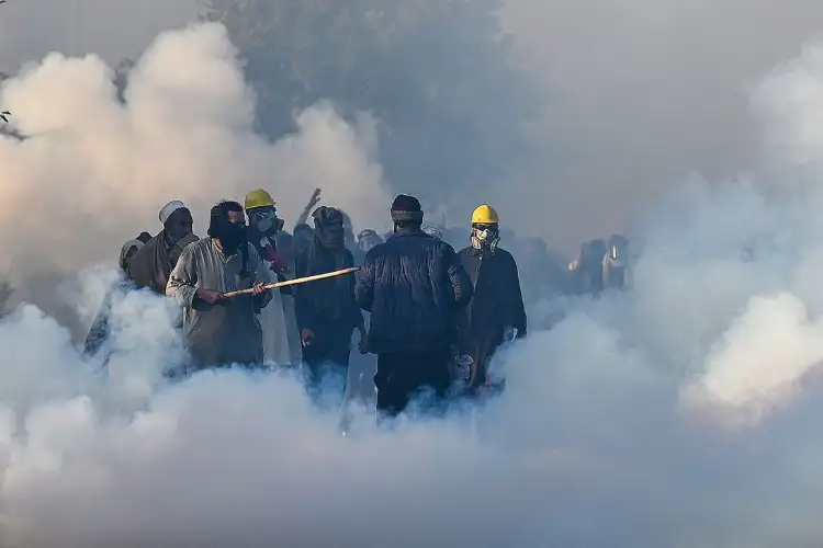 Tensions flare up in PoJK as Pakistani forces shell tear gas on protestors