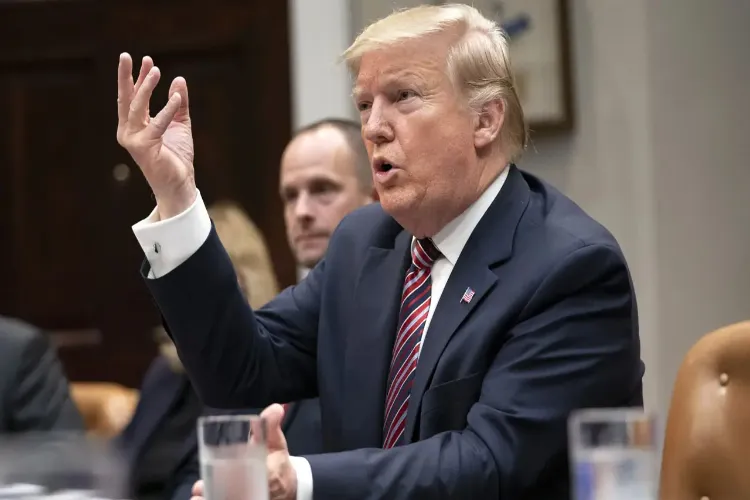 Trump lashes out at critics of the Iran deal.